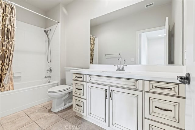 bathroom with visible vents, vanity, toilet, shower / bathtub combination with curtain, and tile patterned floors