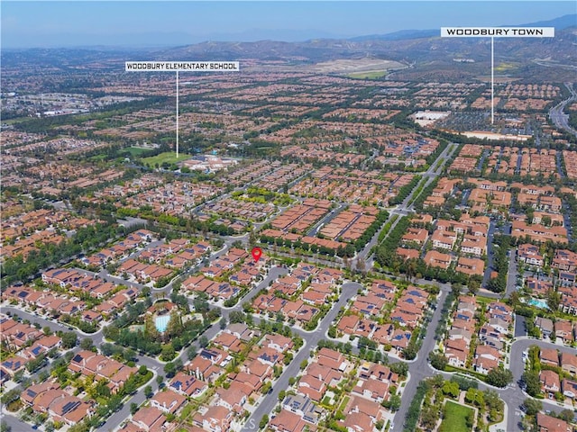 birds eye view of property with a residential view