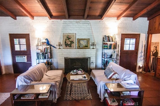 living area featuring a fireplace, beamed ceiling, wooden ceiling, and a wall mounted air conditioner