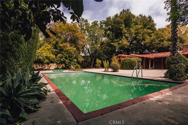 pool featuring a patio