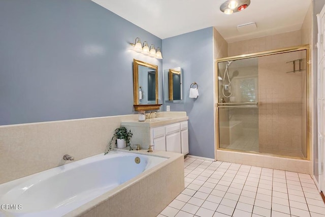 bathroom with vanity, a shower stall, tile patterned floors, and a bath