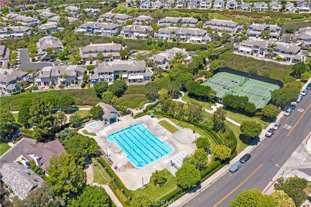 birds eye view of property with a residential view
