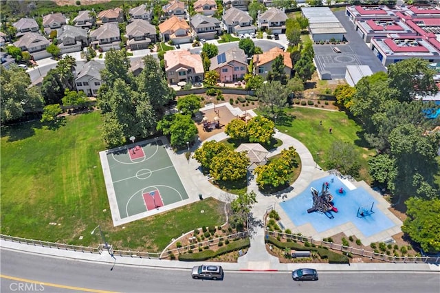 birds eye view of property with a residential view