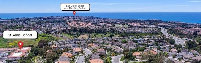 bird's eye view featuring a residential view and a water view