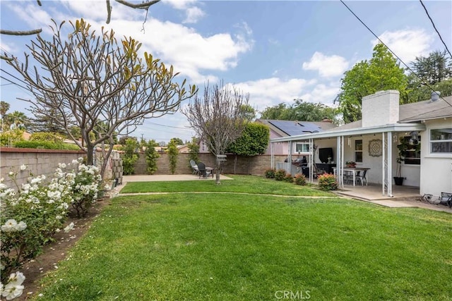 view of yard featuring a fenced backyard and a patio area