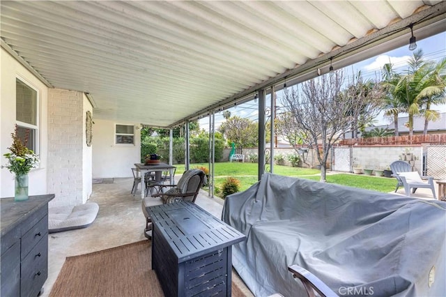 view of patio / terrace with outdoor dining area, a fenced backyard, and an outdoor hangout area