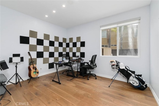 office area with recessed lighting, baseboards, and wood finished floors