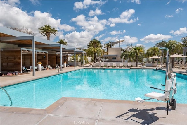 community pool featuring a patio area