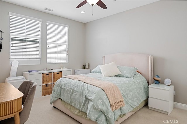 bedroom with recessed lighting, ceiling fan, light colored carpet, and baseboards