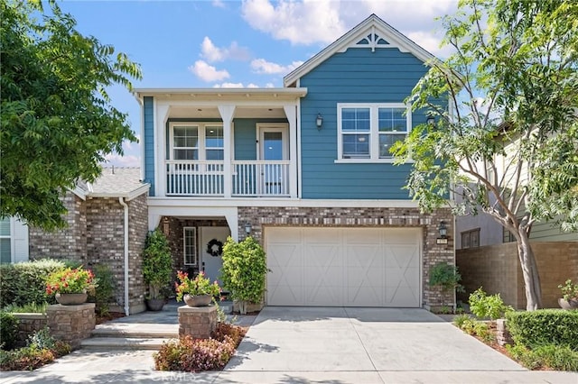 view of front of house featuring concrete driveway, brick siding, and an attached garage