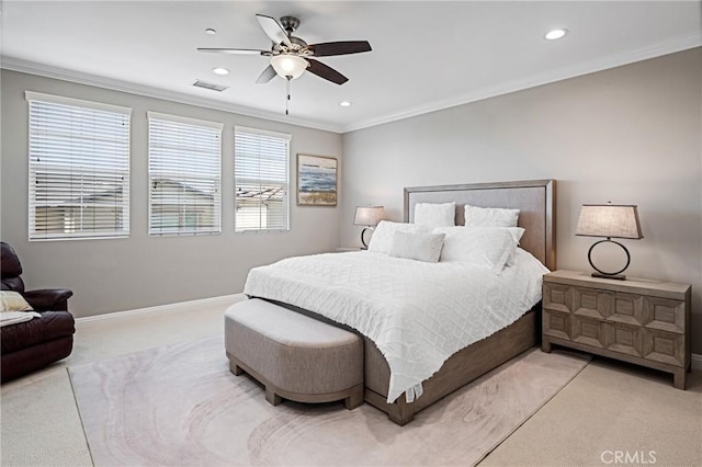 bedroom with crown molding, baseboards, light carpet, and recessed lighting