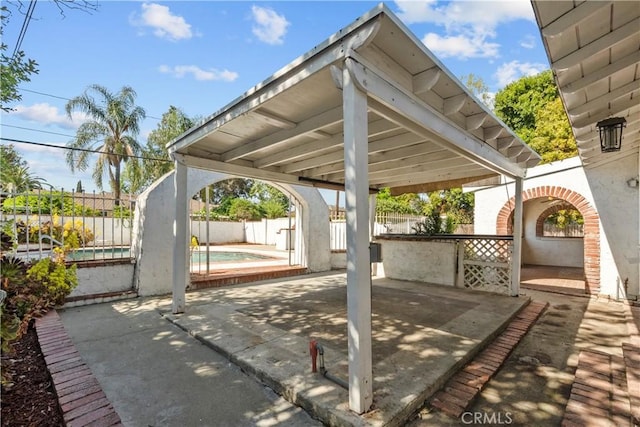 view of patio featuring a fenced in pool and a fenced backyard