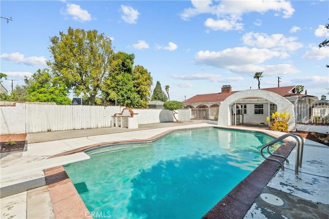 view of pool with a fenced backyard, a fenced in pool, and a patio