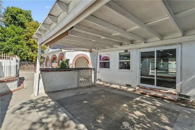 view of patio with fence