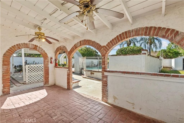 view of patio featuring a ceiling fan and fence private yard