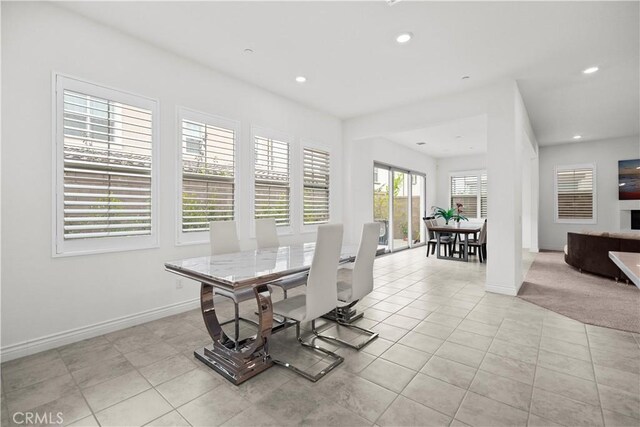 107 Frontier, Irvine, CA 92620 - dining area with recessed lighting, baseboards, and light tile patterned flooring