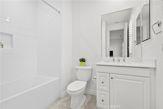 bathroom featuring vanity, visible vents, toilet, baseboards, and shower / bath combination