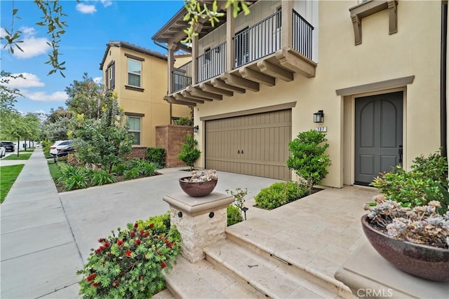 107 Frontier, Irvine, CA 92620 - view of front of home featuring a balcony and stucco siding