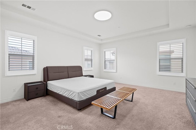 107 Frontier, Irvine, CA 92620 - bedroom featuring a tray ceiling, carpet flooring, and baseboards