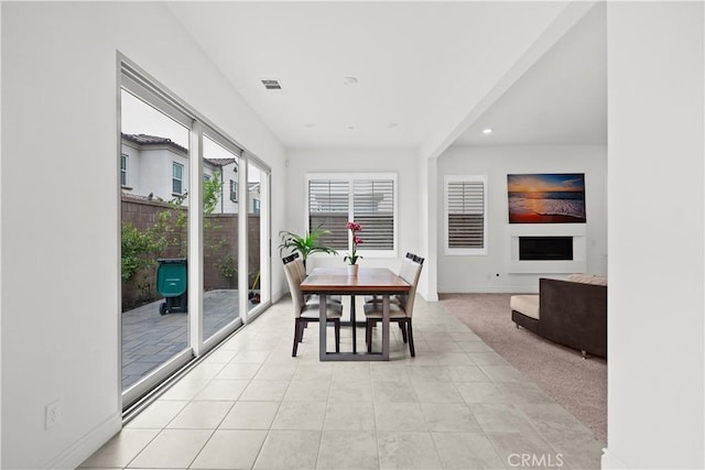 dining area featuring recessed lighting, baseboards, visible vents, and light tile patterned floors
