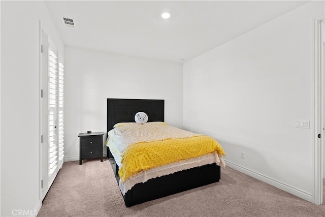 bedroom featuring recessed lighting, baseboards, visible vents, and carpet