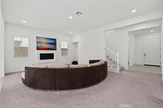 107 Frontier, Irvine, CA 92620 - living room with carpet floors, recessed lighting, stairs, a fireplace, and baseboards