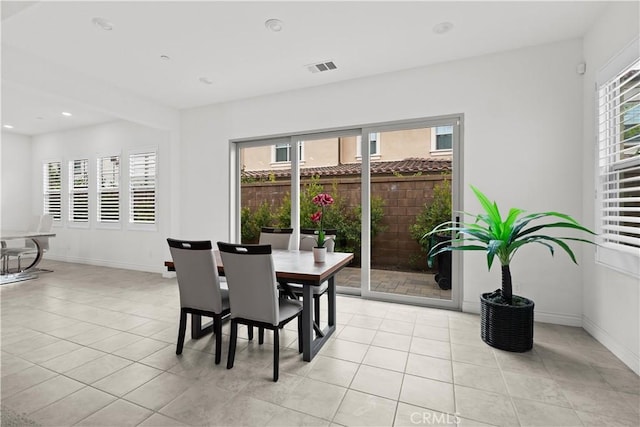 107 Frontier, Irvine, CA 92620 - dining space with light tile patterned flooring, recessed lighting, and baseboards