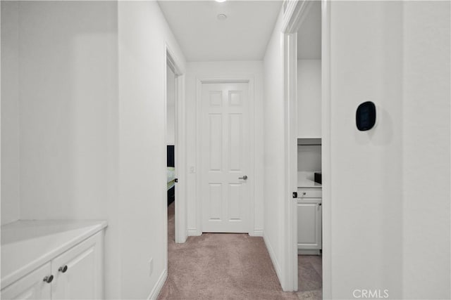 107 Frontier, Irvine, CA 92620 - hallway featuring light colored carpet and baseboards