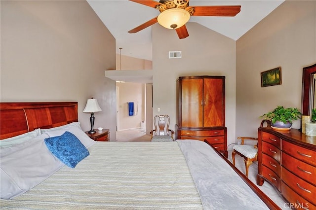 bedroom with visible vents, carpet floors, high vaulted ceiling, and ceiling fan