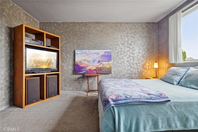 bedroom featuring carpet