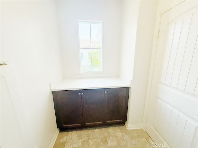 interior space with baseboards