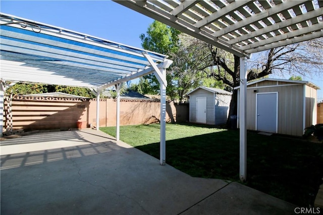 view of patio / terrace with an outdoor structure, a fenced backyard, a pergola, and a storage shed