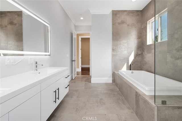 bathroom with double vanity, ornamental molding, recessed lighting, a bath, and a sink