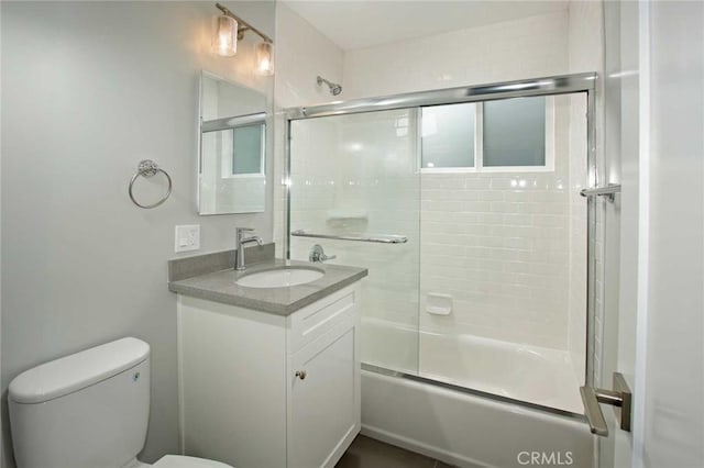 5459 Carlin St, Los Angeles, CA 90016 - full bath featuring vanity, bath / shower combo with glass door, and toilet