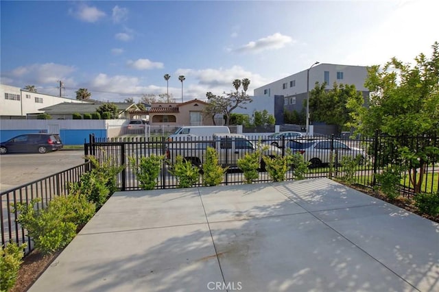 5459 Carlin St, Los Angeles, CA 90016 - view of patio / terrace with fence and a residential view