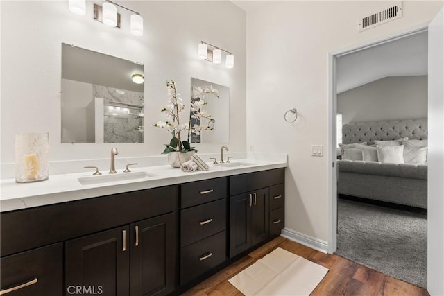 21340 Via Del Puma, Yorba Linda, CA 92887 - bathroom with ensuite bathroom, double vanity, wood finished floors, a shower, and lofted ceiling