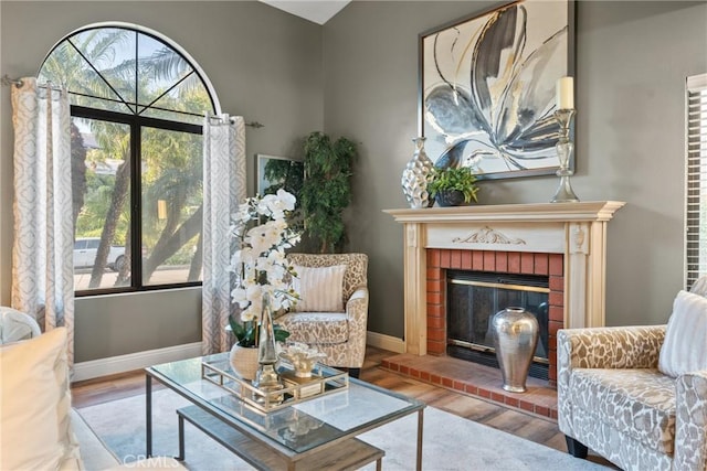 21340 Via Del Puma, Yorba Linda, CA 92887 - living area with wood finished floors and a brick fireplace