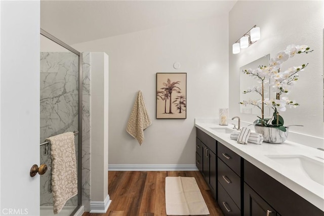 21340 Via Del Puma, Yorba Linda, CA 92887 - full bathroom featuring double vanity, a marble finish shower, and wood finished floors