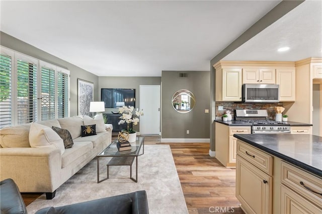 21340 Via Del Puma, Yorba Linda, CA 92887 - living room with baseboards and light wood-style flooring