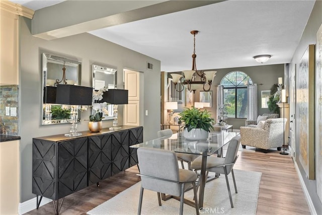 21340 Via Del Puma, Yorba Linda, CA 92887 - dining space with light wood finished floors and a chandelier