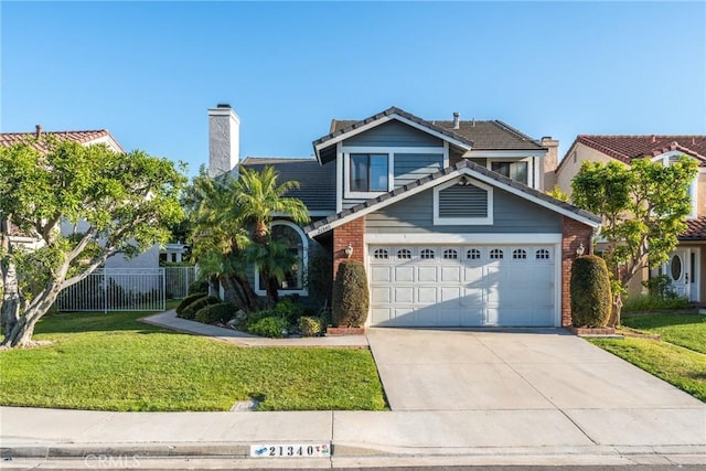 21340 Via Del Puma, Yorba Linda, CA 92887 - traditional-style house featuring concrete driveway, a tiled roof, a garage, and a chimney