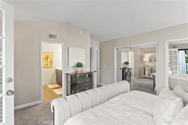 21340 Via Del Puma, Yorba Linda, CA 92887 - bedroom featuring lofted ceiling, light colored carpet, and ensuite bathroom