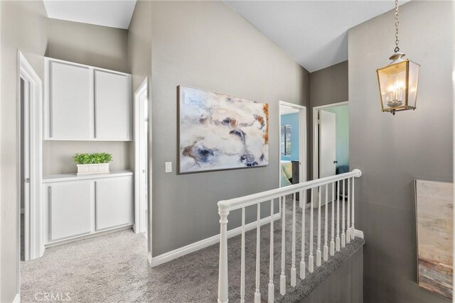 21340 Via Del Puma, Yorba Linda, CA 92887 - corridor featuring carpet flooring, an upstairs landing, and a chandelier