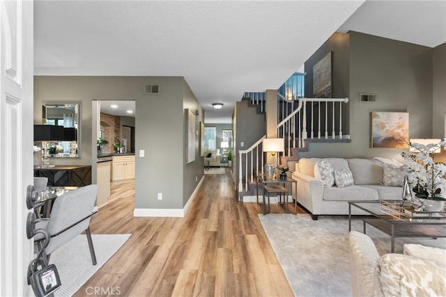 21340 Via Del Puma, Yorba Linda, CA 92887 - living area with light wood-style floors and stairway