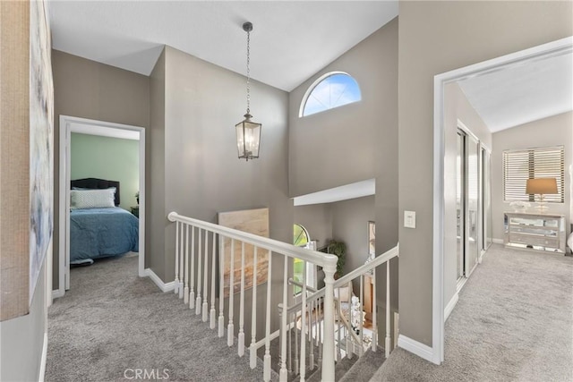 21340 Via Del Puma, Yorba Linda, CA 92887 - corridor with vaulted ceiling, carpet, and an upstairs landing