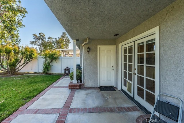 21340 Via Del Puma, Yorba Linda, CA 92887 - doorway to property with stucco siding, french doors, and a patio