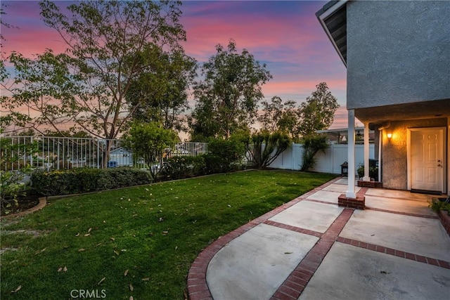 21340 Via Del Puma, Yorba Linda, CA 92887 - yard at dusk with a fenced backyard and a patio
