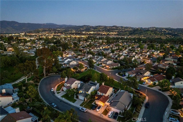 21340 Via Del Puma, Yorba Linda, CA 92887 - aerial overview of property's location featuring nearby suburban area and a mountainous background