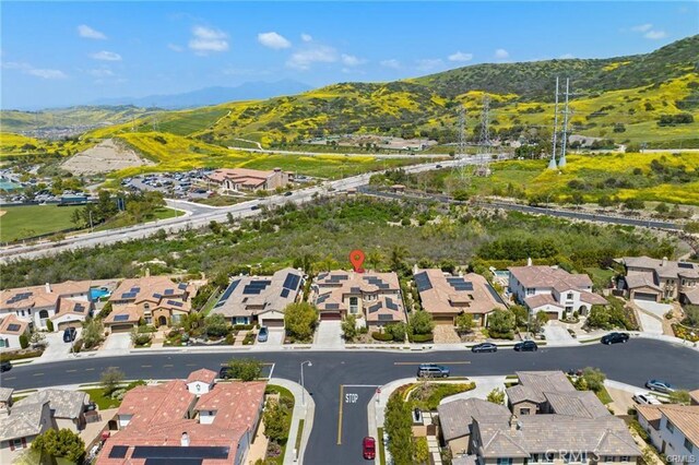 bird's eye view with a residential view and a mountain view
