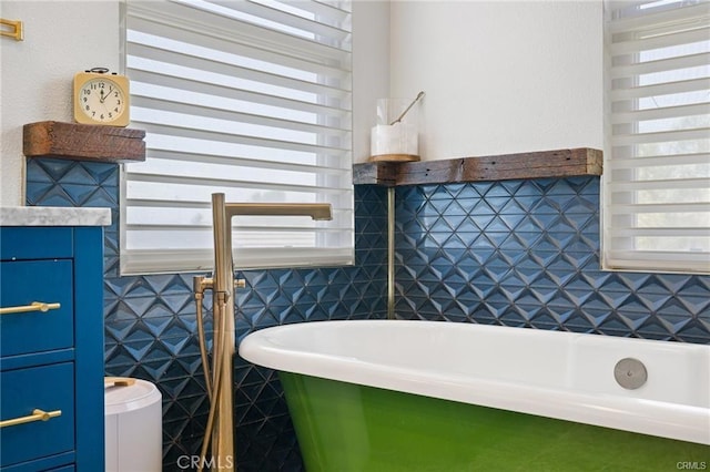 29291 Via Zamora, San Juan Capistrano, CA 92675 - bathroom featuring a freestanding bath, tile walls, and toilet